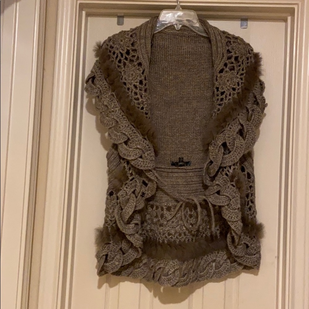 Lovely sweater vest. Great with jeans
